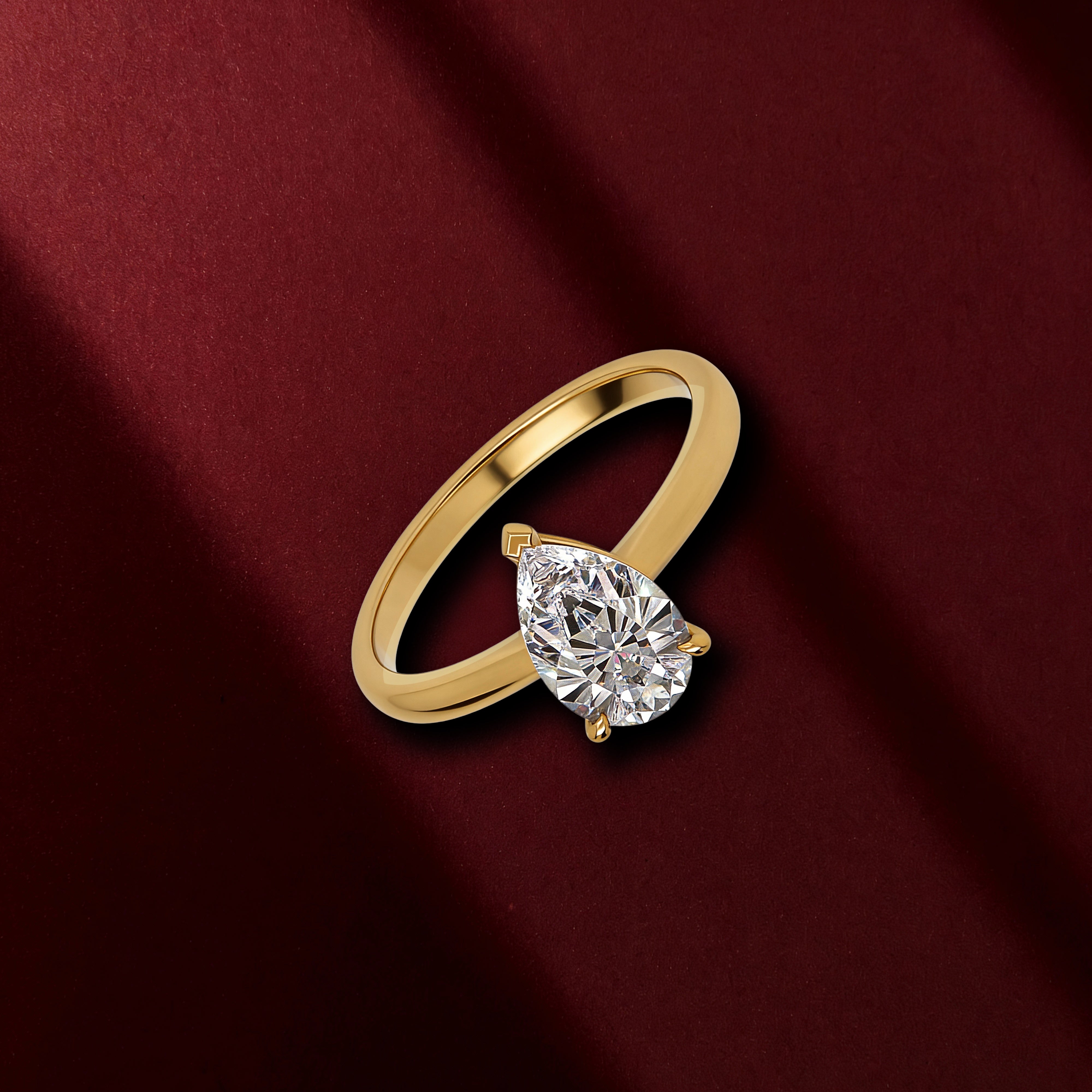 Pear Solitaire Ring